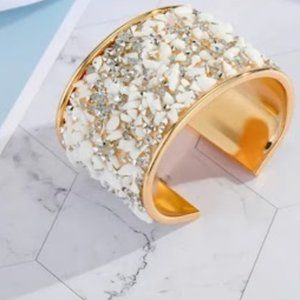 Wide cuff gold bracelet with beautiful small stones